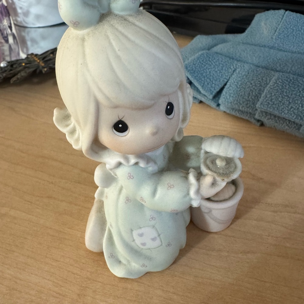 Precious Moments White and Cream Figurine